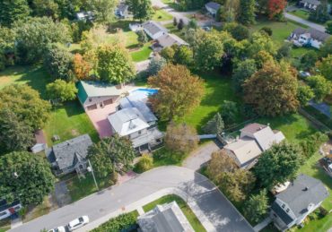 an aerial view of a neighborhood in the suburbs