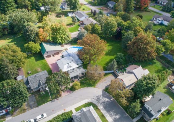 an aerial view of a neighborhood in the suburbs